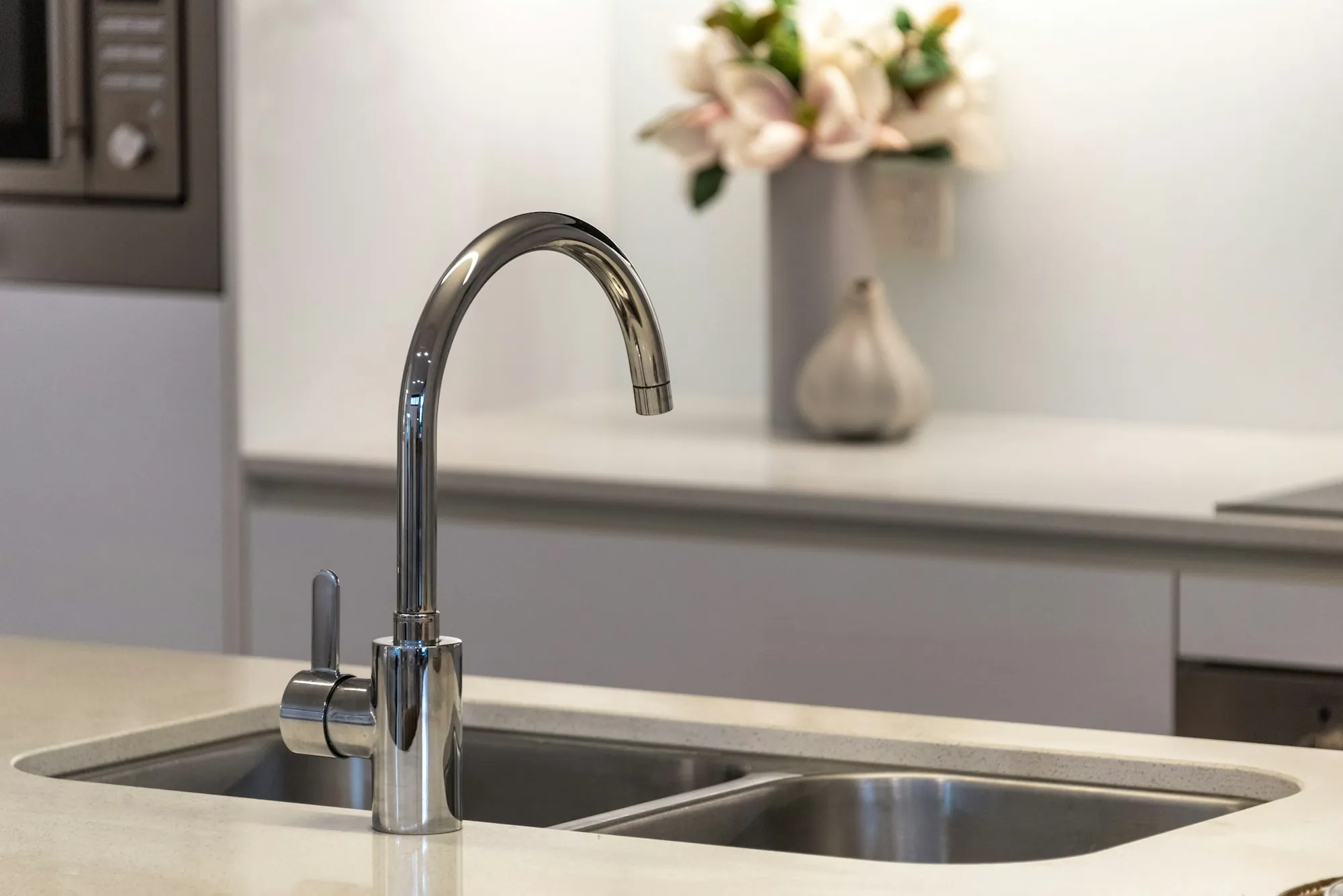 Stainless double sink with a chrome faucet